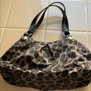 Coach Black Leopard purse.